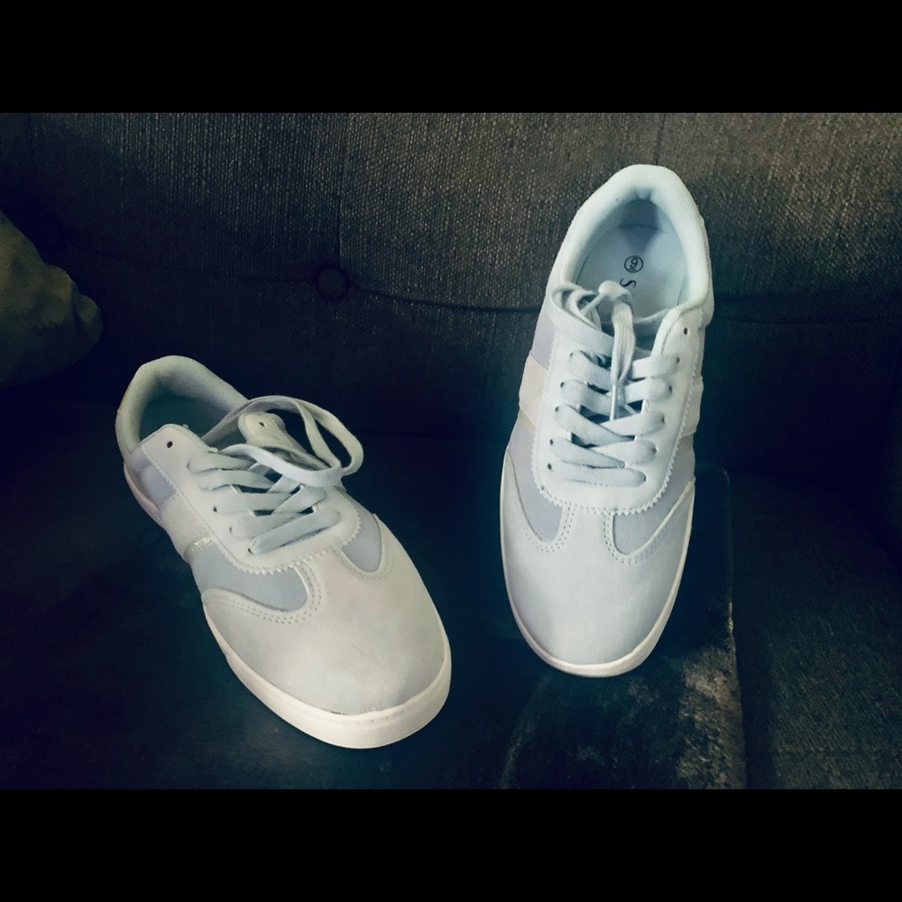 New without tags light blue with sparkle silver accents  size 9 sneakers